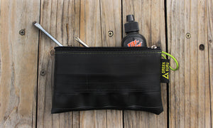 mid-size zipper pouch green guru upcycled filled with bike tools accessories